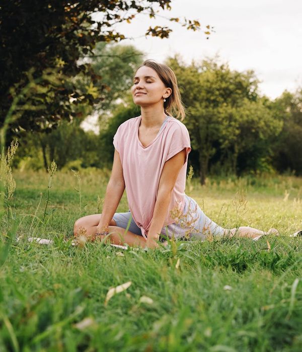 Person taking the first step on a yoga mat in a calm environment.
